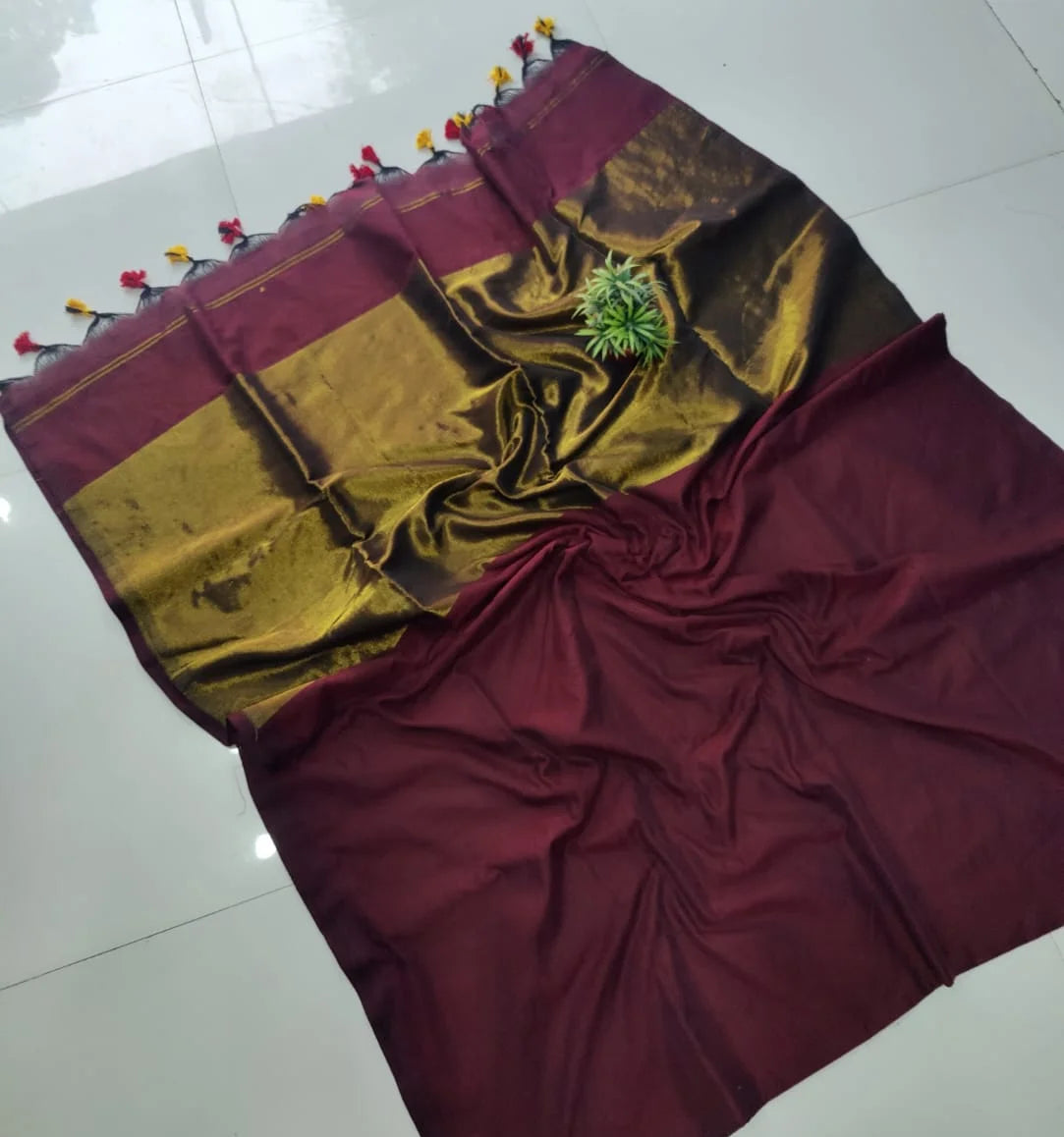 Nayanthara award saree - Maroon Khadi saree with gold tissue zari pallu