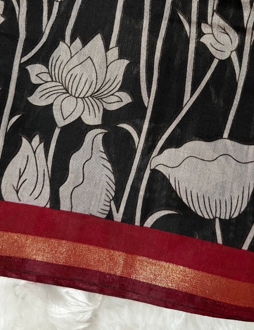 Floral Kalamkari Silk Saree – Black with Red Zari Border