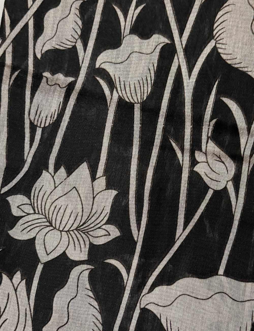 Floral Kalamkari Silk Saree – Black with Red Zari Border